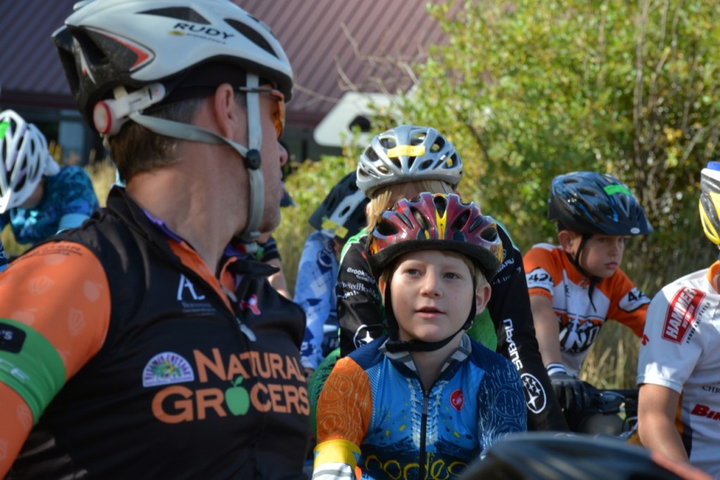 B. listening to his coach in the start queue
