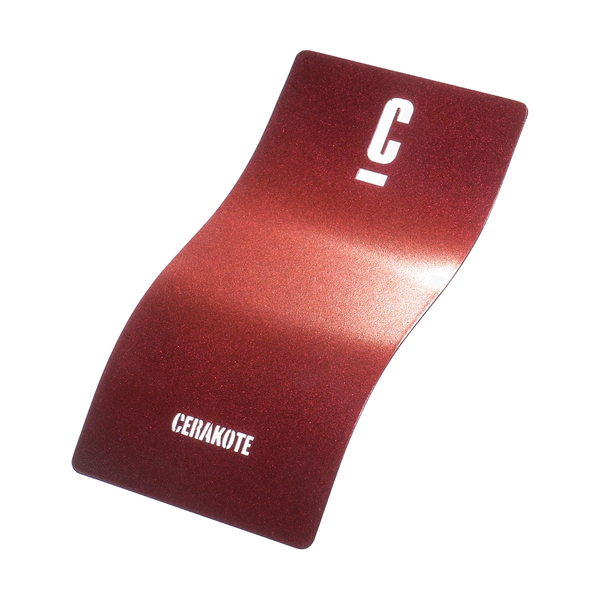 A curved metal color sample in a glossy red finish with 'C' and 'CERAKOTE' printed on it.