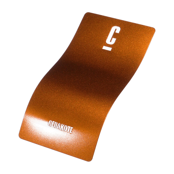 A curved metallic color sample card in vibrant orange with a white 'C' printed on it, labeled 'CENAKOTE'.